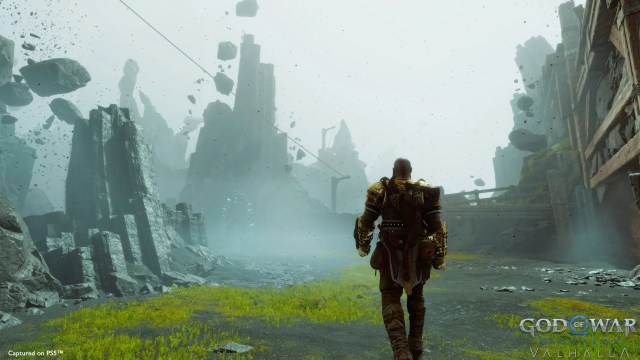Kratos walking in a green pasture in God of War Ragnarok Valhalla