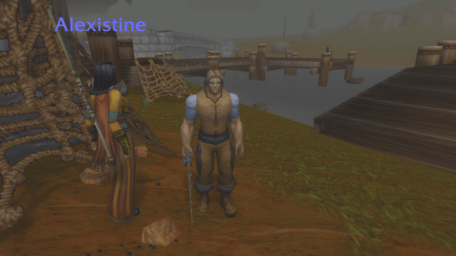 Image of a man holding a fishing pole in WoW SoD.