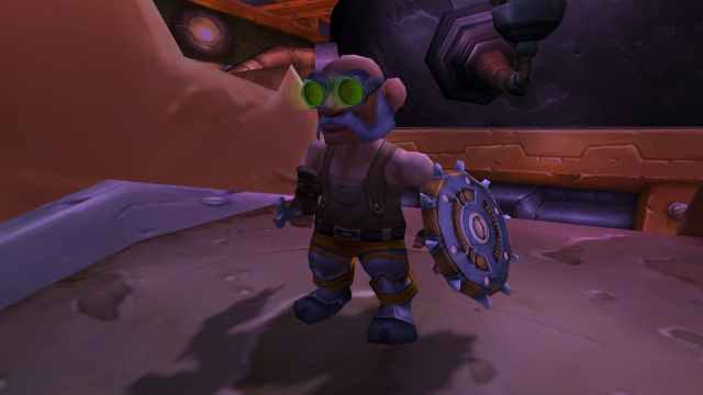 The King of Gnomes holding a giant cog as a shield and a wrench as a weapon