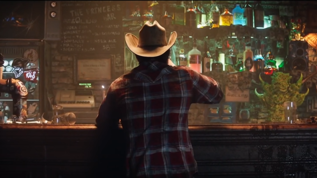 Wolverine sitting and drinking by a bar.