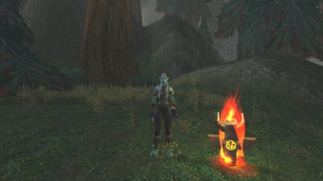 WoW Classic Shaman standing next to a totem in Silverpine Forest