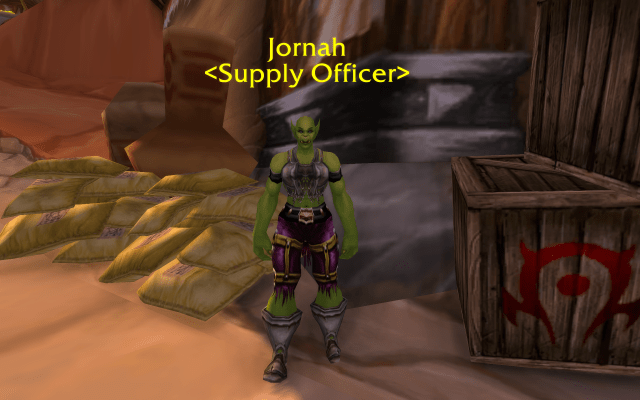 Supply Officer in Orgrimmar standing next to a crate of goods.