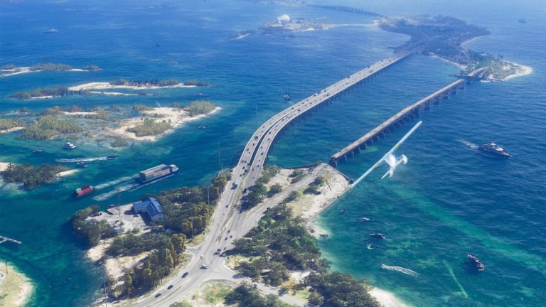 A plane banks left over an archipelago and a highway bridge outside Vice City in GTA 6.