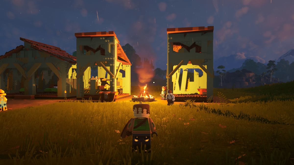 A fledgling village lit by campfire in LEGO Fortnite.