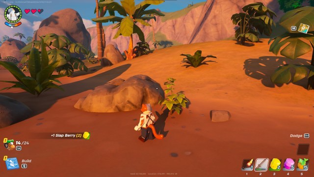 A player in LEGO Fortnite collecting Slap Berries.