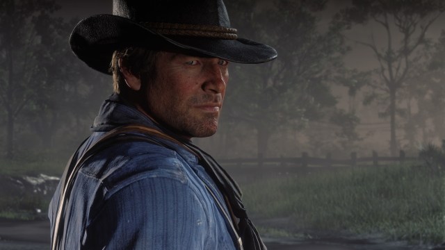 Arthur Morgan looking at the screen in Red Dead Redemption 2.
