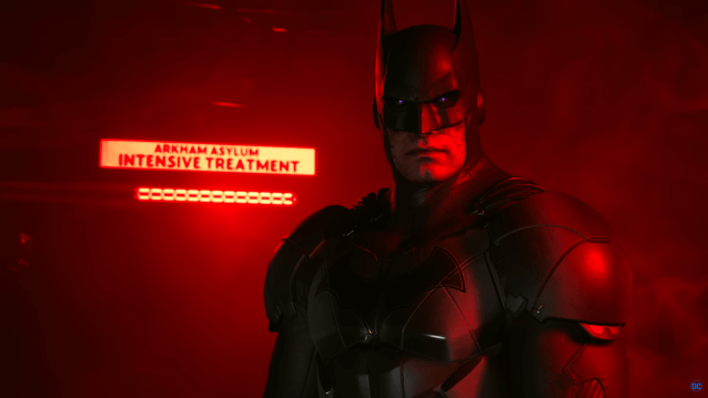 Batman looking at Suicide Squad with red light shining upon him.