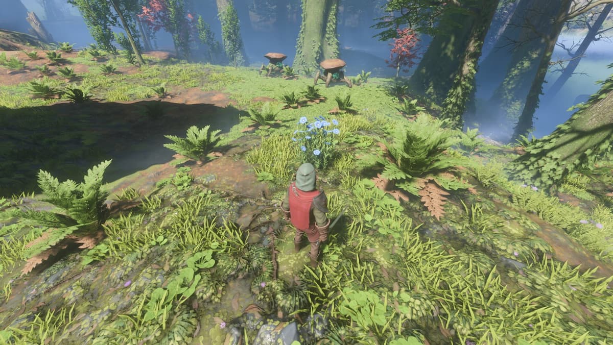 This screenshot shows a player from Enshrouded looking at a Flax flower, a blue plant, against a wooded background