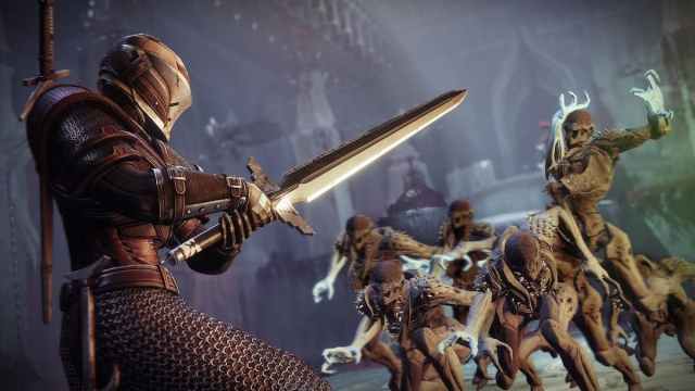 Destiny 2 Titan with a sword fighting off Hive Thrall