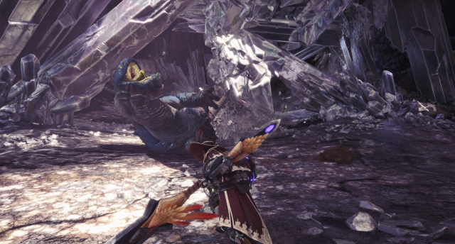 Image of a hunter in Monster Hunter World holding a large weapon.