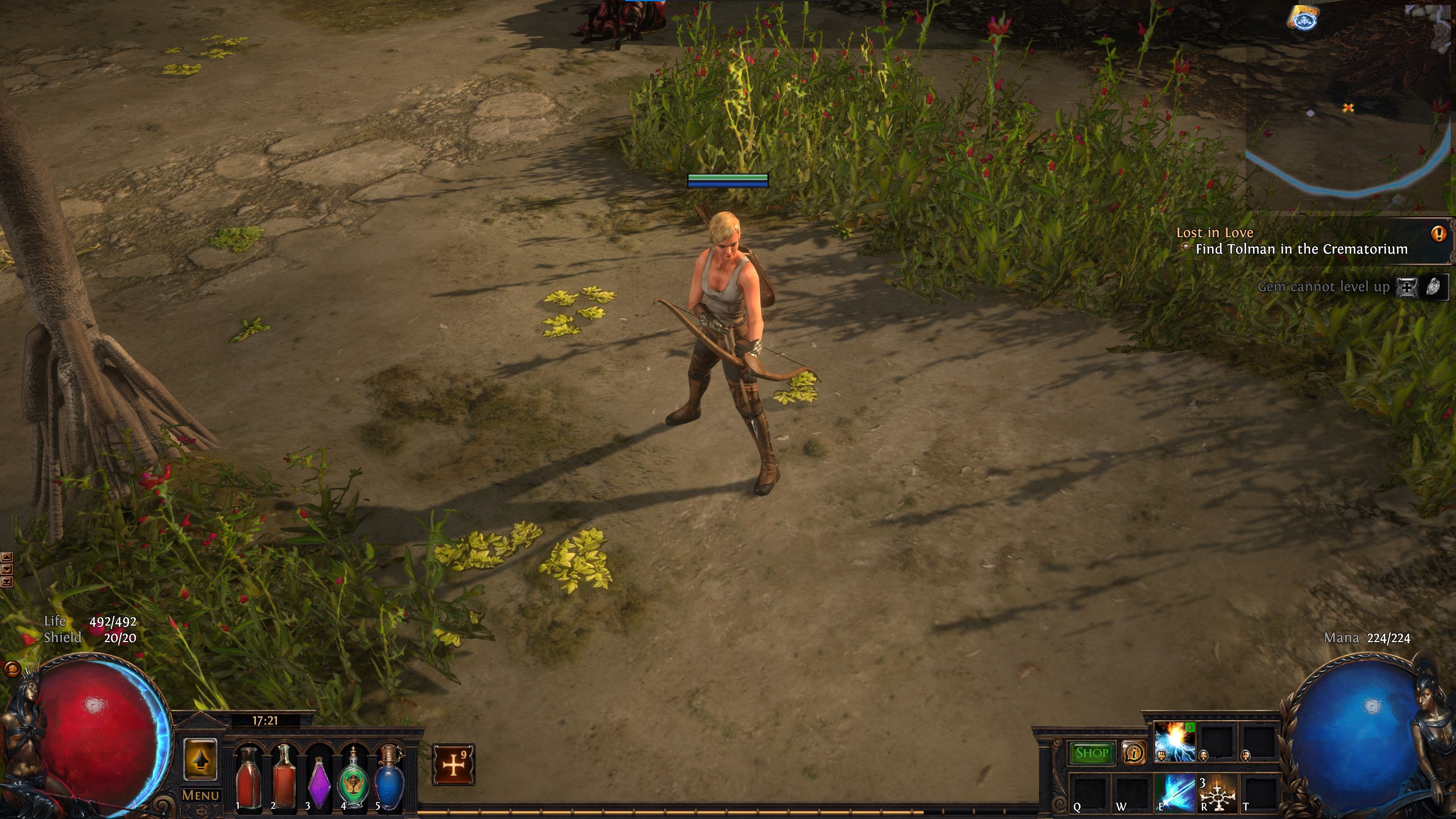 An image of the Ranger standing with her bow on a forest path in Path of Exile.