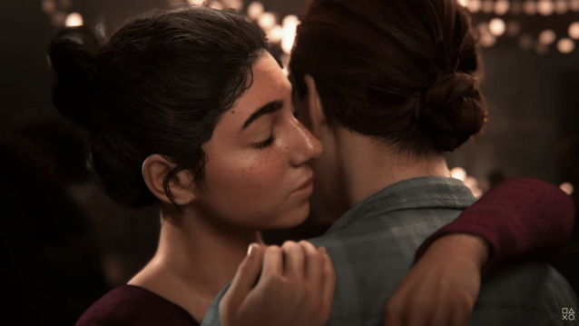 Dina embraces Ellie in The Last of Us Part II.