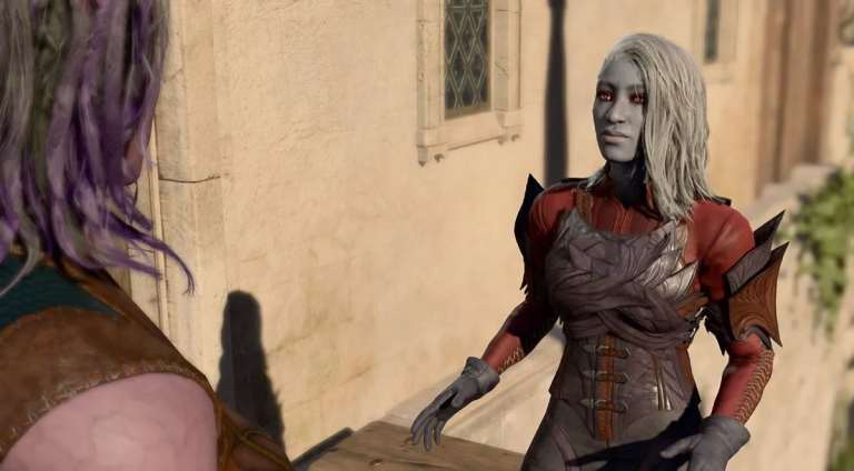 Araj, a Drow woman, stands in front of a beige building. She raises her arms to about waist-height as she looks at the player character.