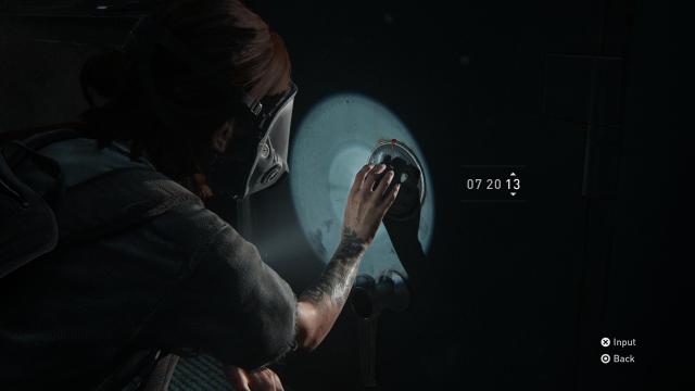 Ellie entering a code in a safe