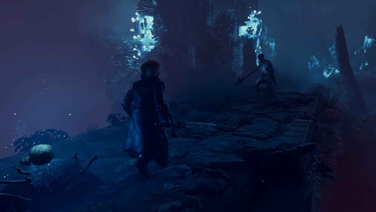 A warrior about to fight in a darkened cavern in Enshrouded.