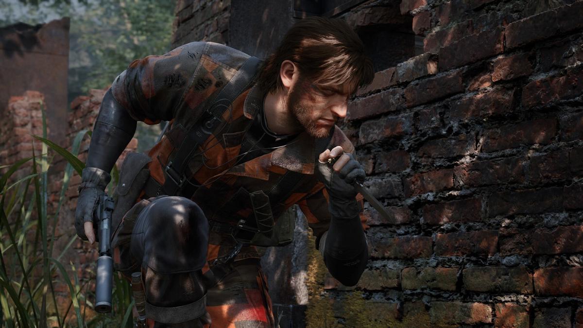 Metal Gear Solid 3 remake Naked Snake sneaking in jungle