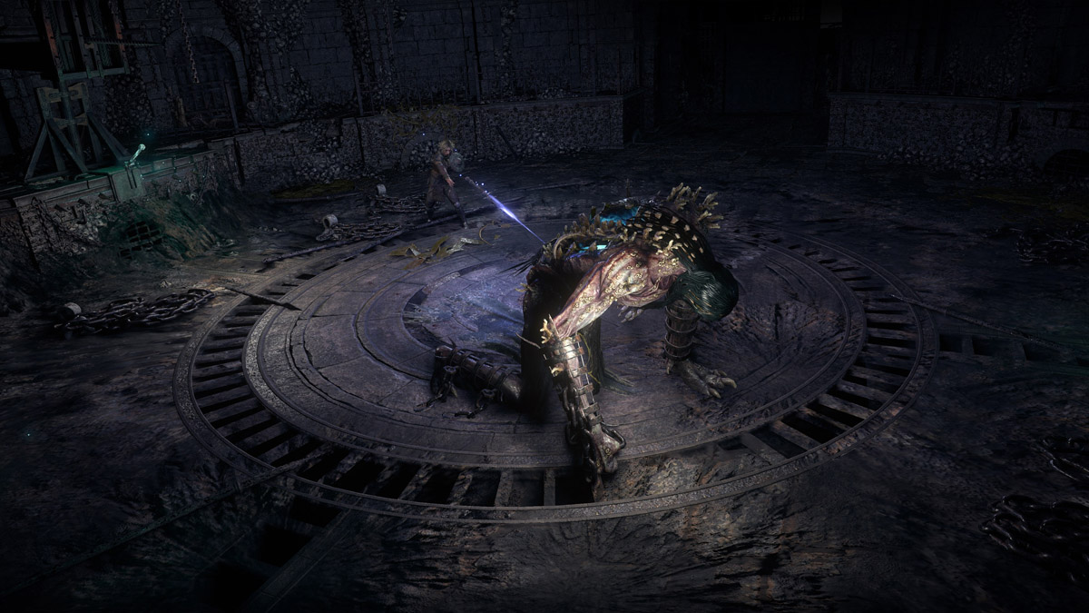 A player stands beside a boss, who is slain on the ground in Path of Exile 2.