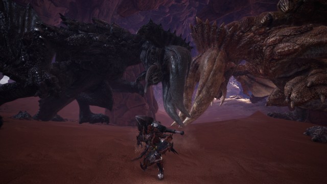 A Diablos and Black Diablos battle in front of a player in Monster Hunter World.