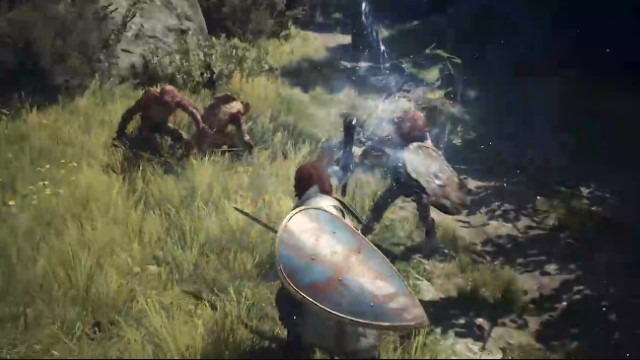 A man with a sword and shield fights a pack of monsters in Dragon's Dogma 2.
