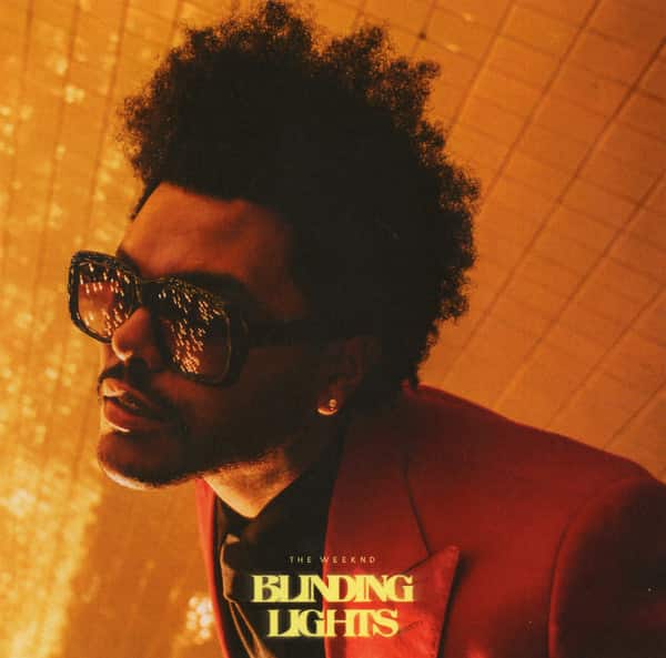 An image of the Blinding Lights cover art, which features the Weeknd with sunglasses in orange and red lighting. 