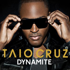 An image from Fortnite Festival of the Dynamite cover art, which features Taio Cruz posing with sunglasses. 
