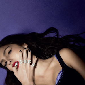An image of the Guts album cover, which contains songs from Fortnite Festival. This cover features Olivia Rodrigo wearing rings. 