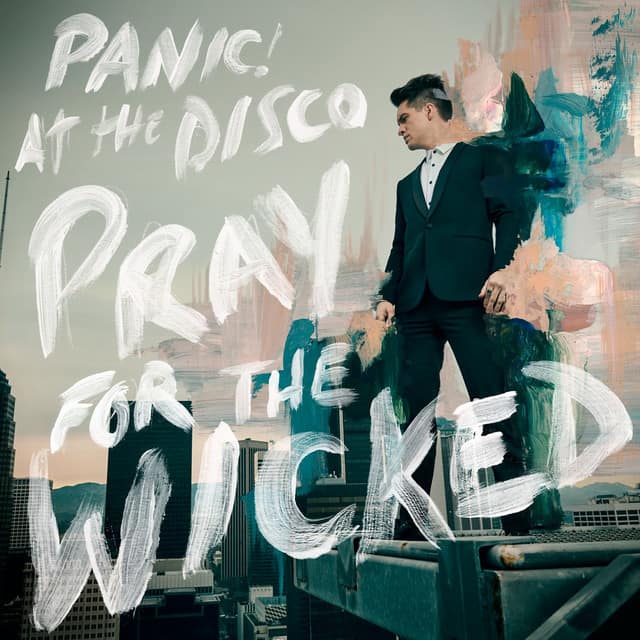 An image from the High Hoeps cover art, which features a man standing on a building in a suit. 