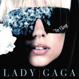 An image of the cover art for the Fame, an album with songs in Fortntie Festival. This includes Lady Gaga wearing crystalized sunglasses. 