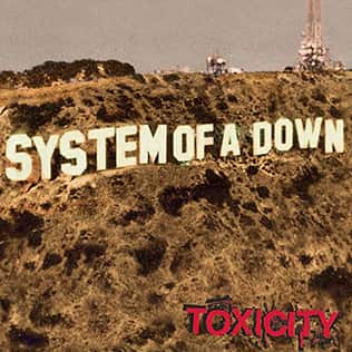An image of the Toxicity cover art from Fortnite Festival, which spells out System Of A Down on the Hollywood sign. 