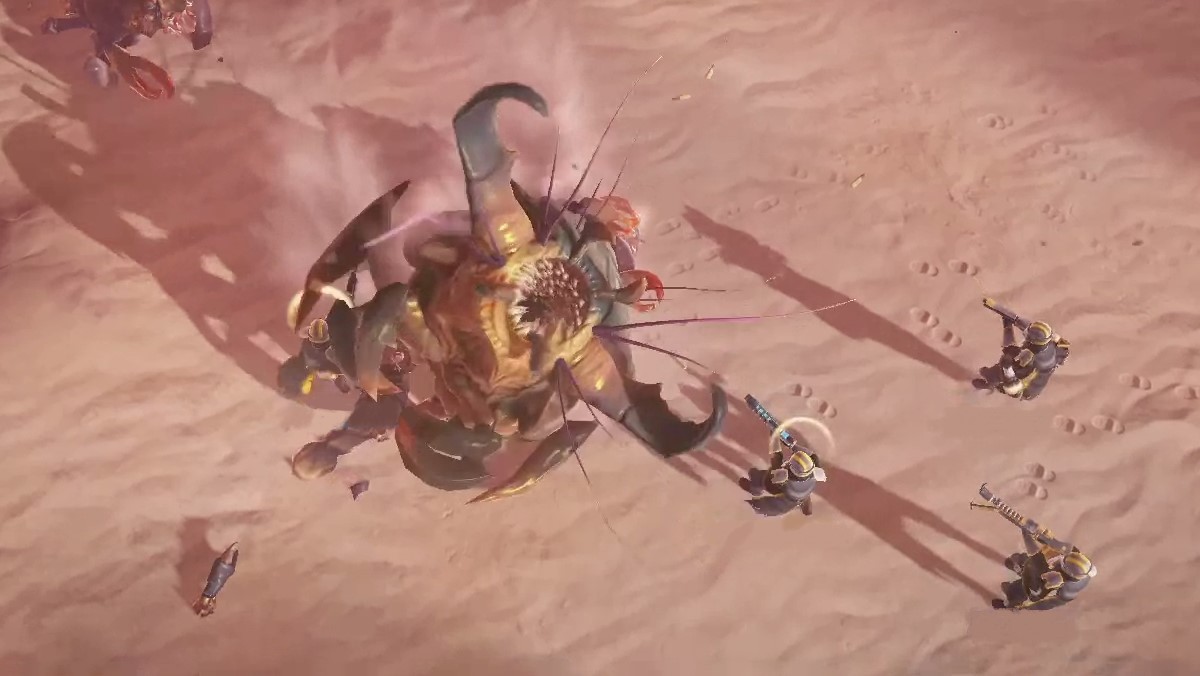 A group of Helldivers fight a large, worm-like bug called a Hive Lord.