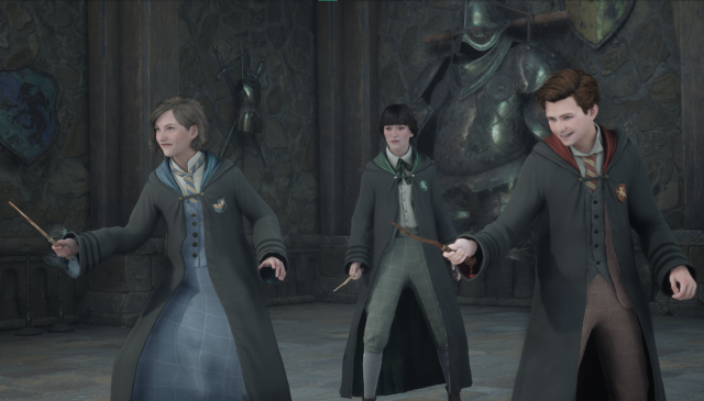 A screenshot of three characters with wands and robes ready to cast spells.