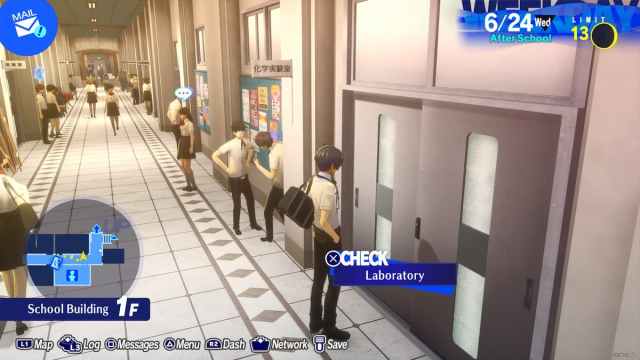 Persona 3 Reload protagonist standing in front of the school Laboratory