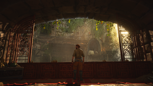 A pirate looking out over a balcony in Skull and Bones.