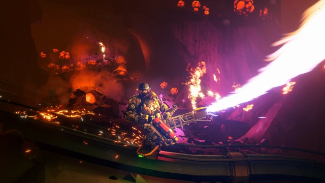 Deep Rock Galactic dwarf using a flamethrower to ward off enemies.