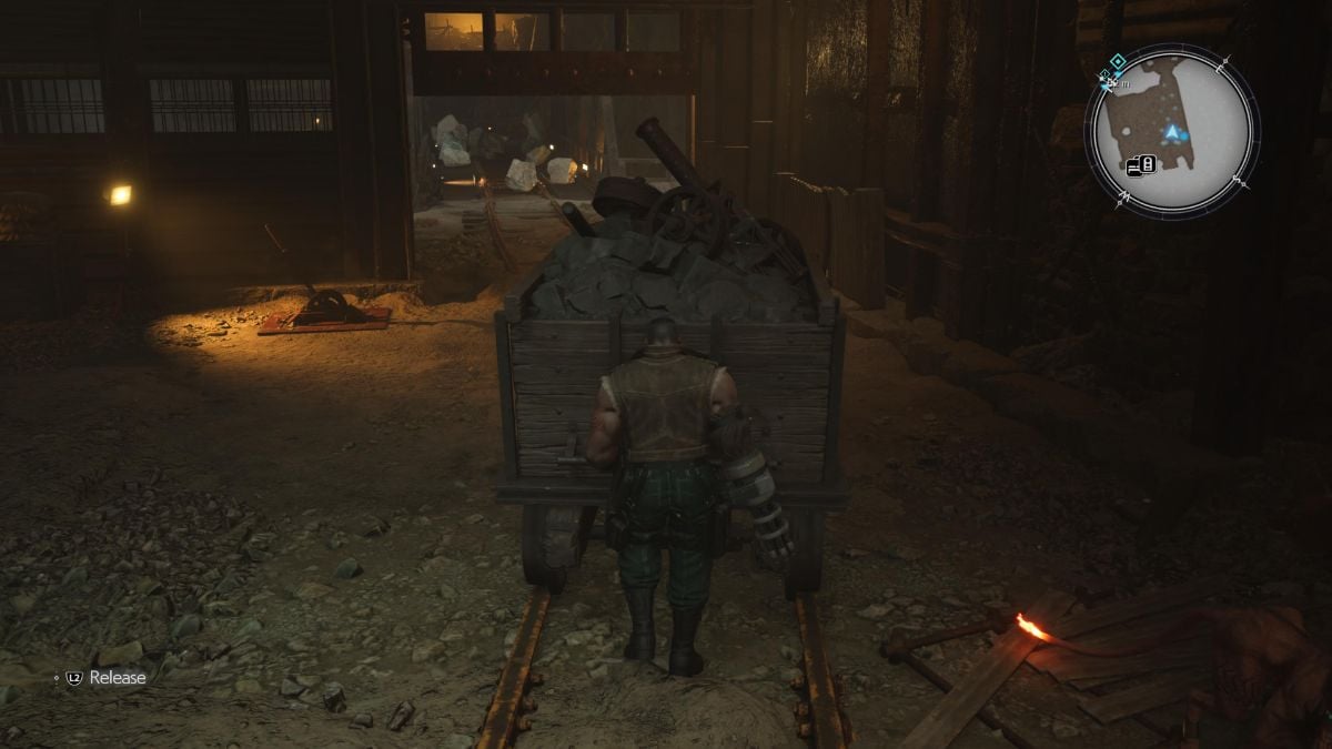 Barret pushing a mine cart through an open gate FF7R