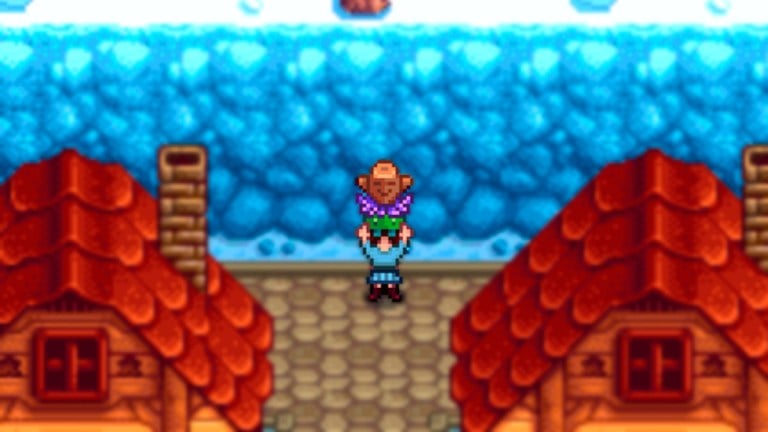 Stardew Valley character holding a warp totem