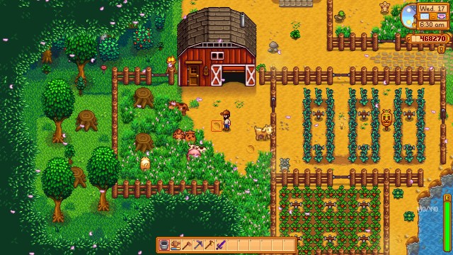 Crops and cows on a forest farm in Stardew Valley.