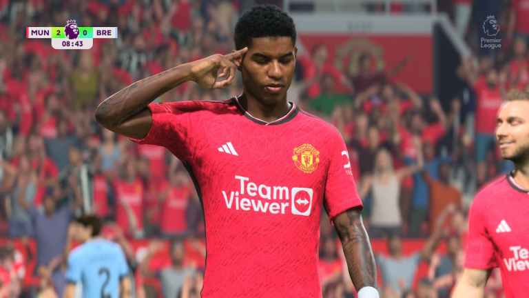 Marcus Rashford celebrates in EA FC 24 after scoring for Manchester United against Brentford.