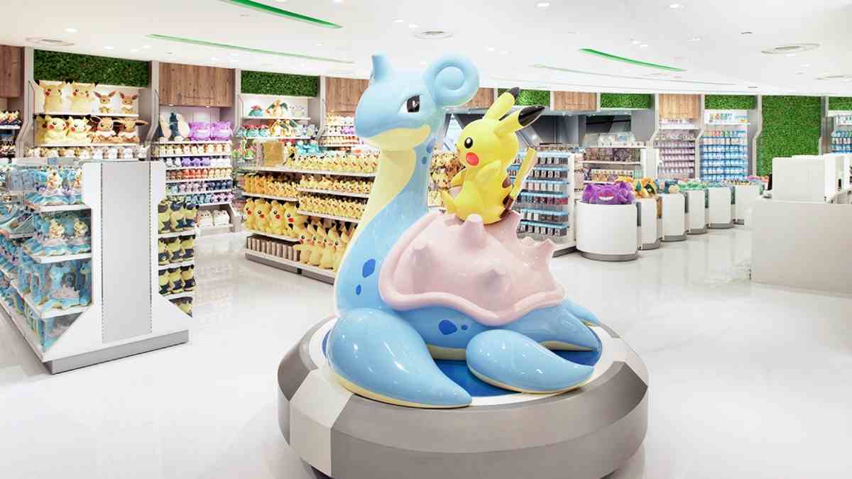 A Lapras and Pikachu statue in a Pokemon Center store.