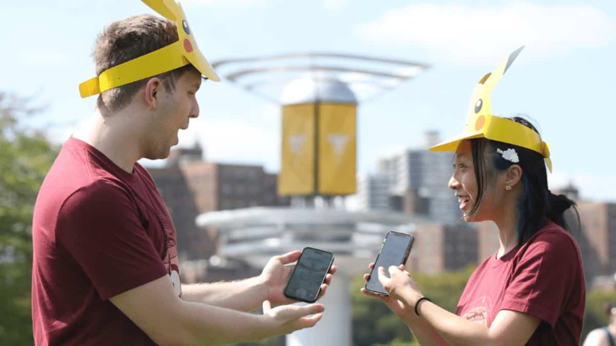 Pokemon Go Players at Go Tour celebrating a catch.