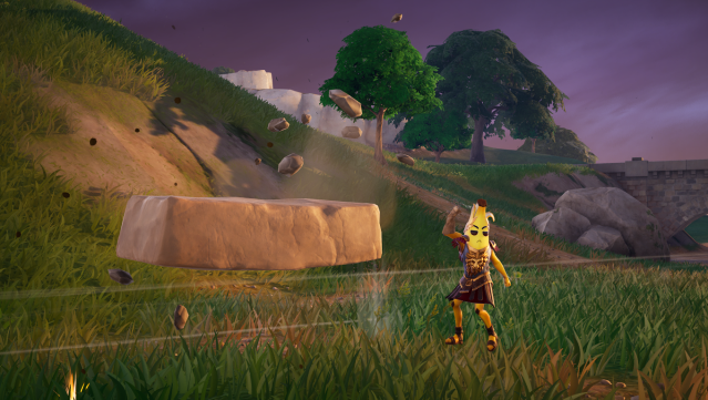 A player in a banana outfit uses the Earthbending ability in Fortnite.