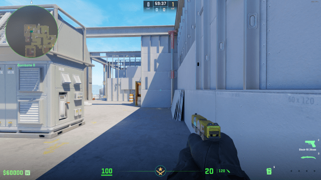 A player holds a pistol facing forward on Vertigo in CS2.