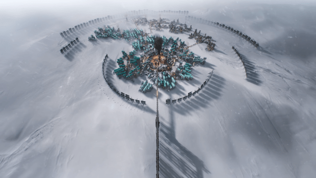 A city of buildings is constructed in a snowscape in Frostpunk 2.