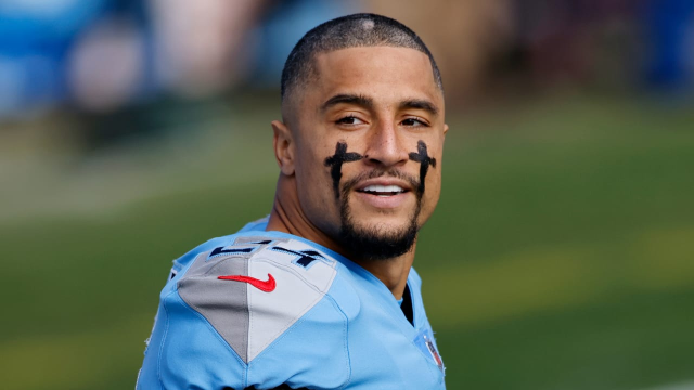 Kenny Vaccaro, an NFL player for the Tennessee Titans, takes to the field.