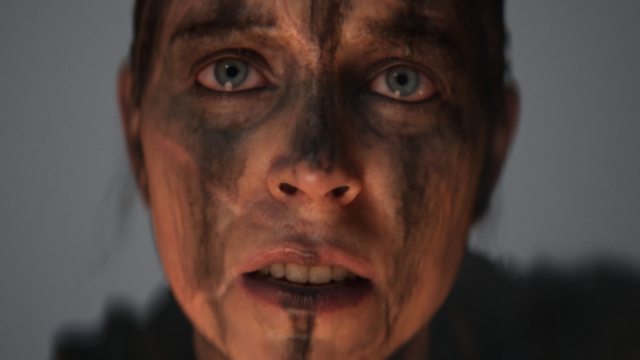 A close up of a woman's face in Hellblade 2