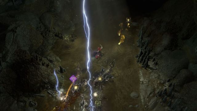 Image showcasing a Rogue fighting constructs in Diablo 4. There is a visible lightning strike raining down from the top of the image.