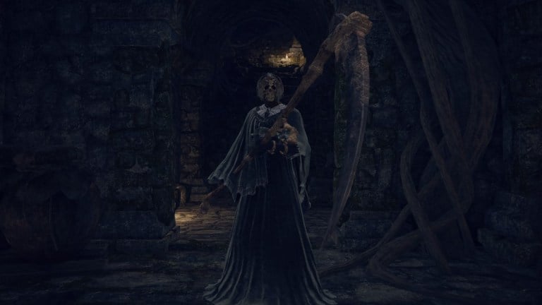 The Tarnished, wearing a Grim Reaper costume, stands in a catacomb.