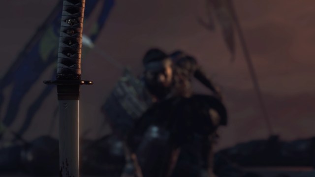 Close up shot of Jin's Katana with Jin out of focus in the background