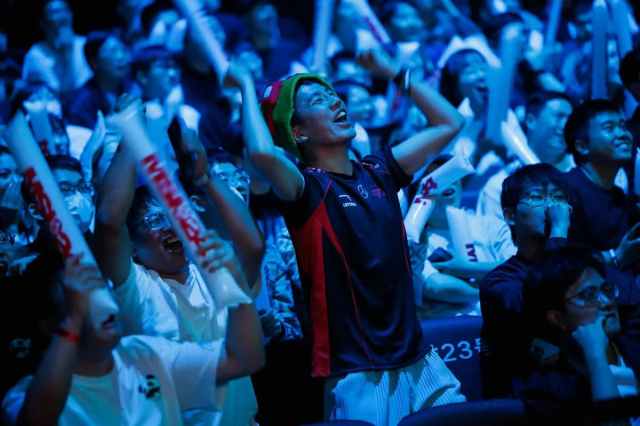 Fans cheering in the audience at MSI 2024.