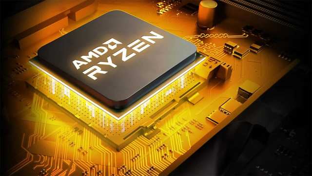 AMD Ryzen CPU with bright yellow light underneath it